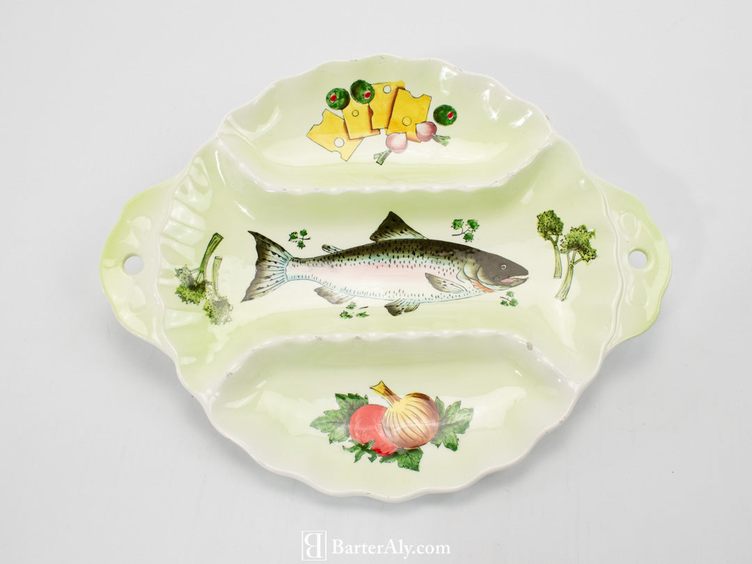 Fish and veggies dinner serving plate appetizers used green