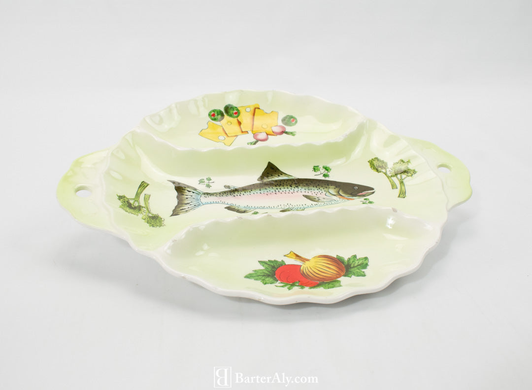 Fish and veggies dinner serving plate appetizers used green