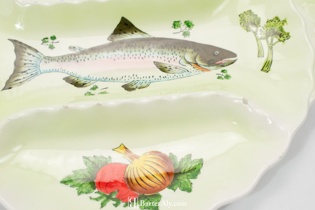 Fish and veggies dinner serving plate appetizers used green