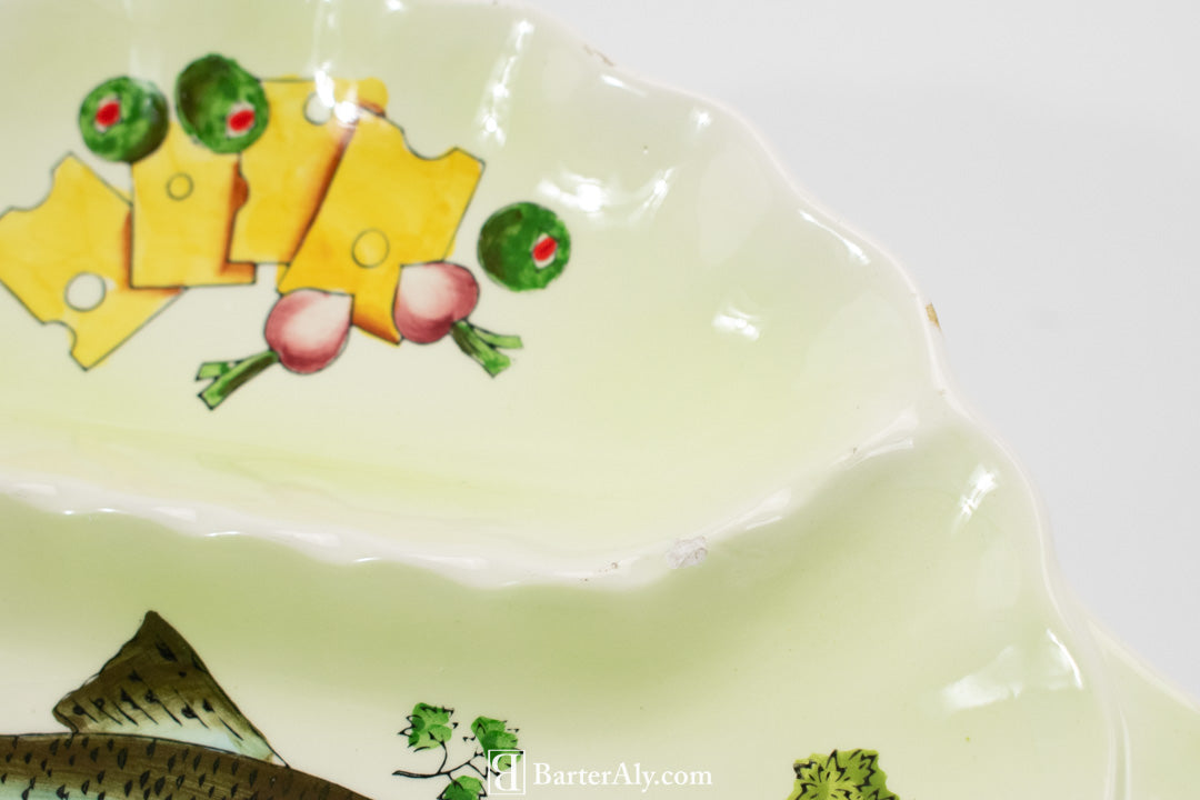 Fish and veggies dinner serving plate appetizers used green