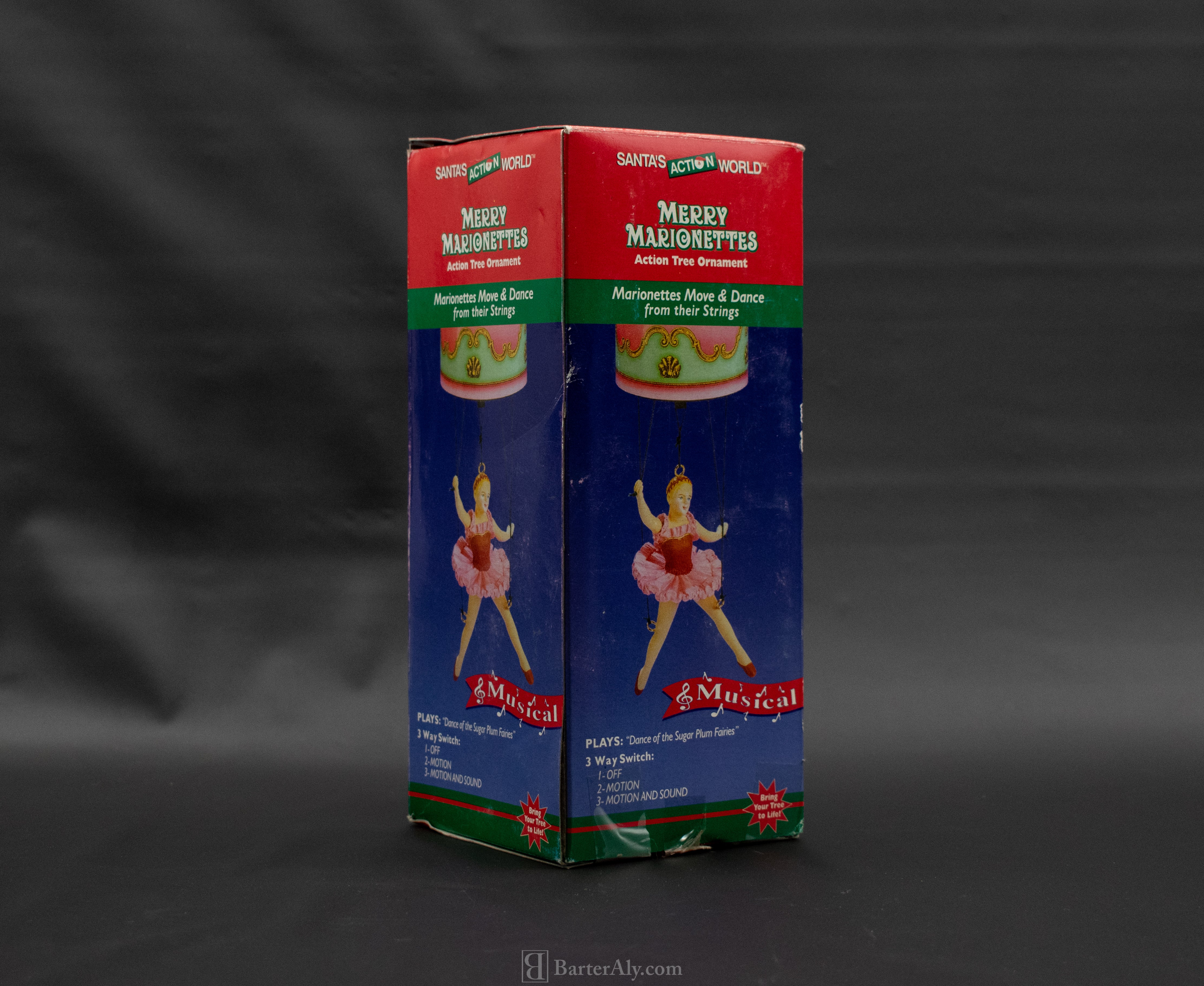 Merry Marionettes Action Tree Ornament Open Box Musical Christmas Move and dance Ornament