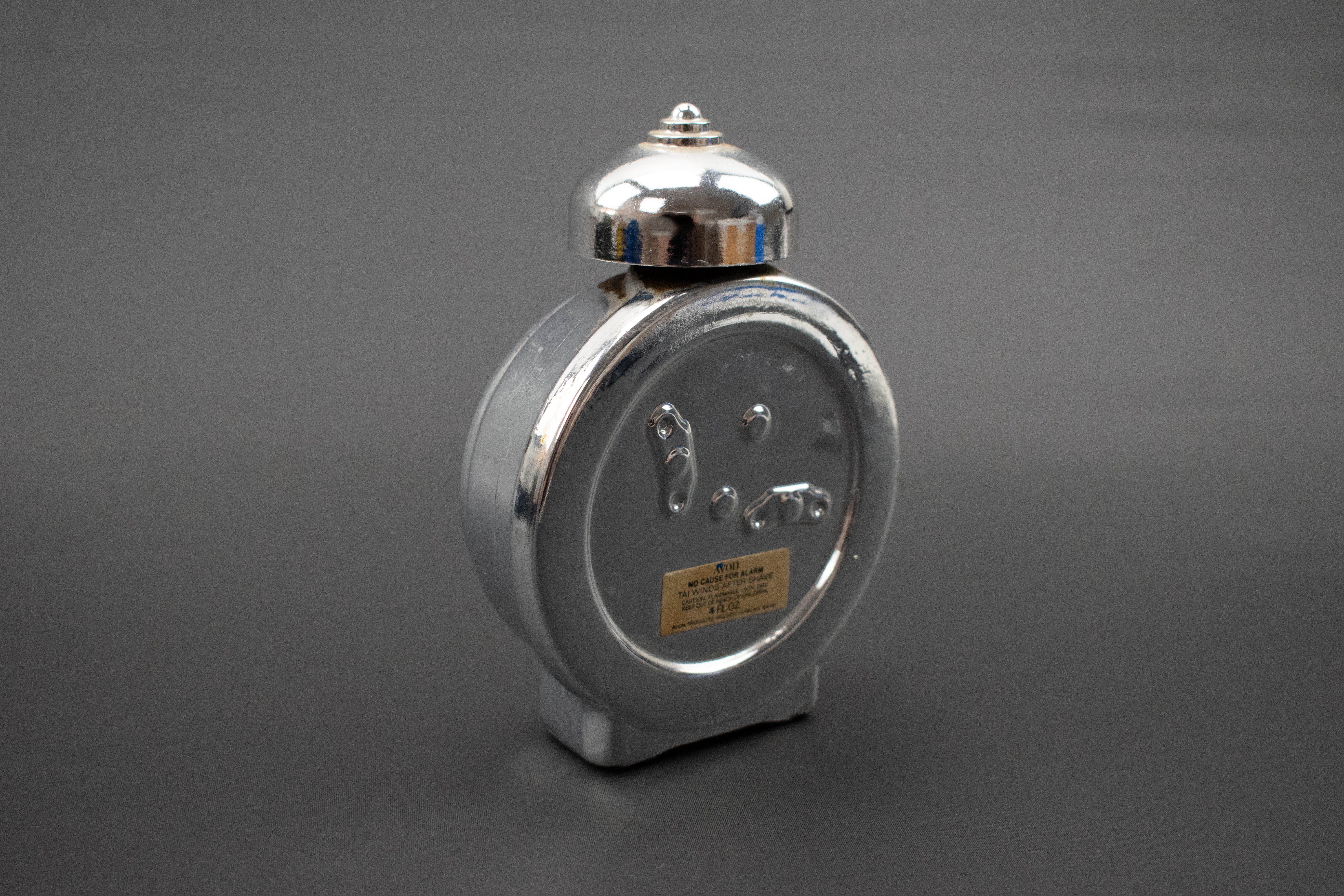 Avon Bottle Used Tai Winds Aftershave Silver Clock Decanter