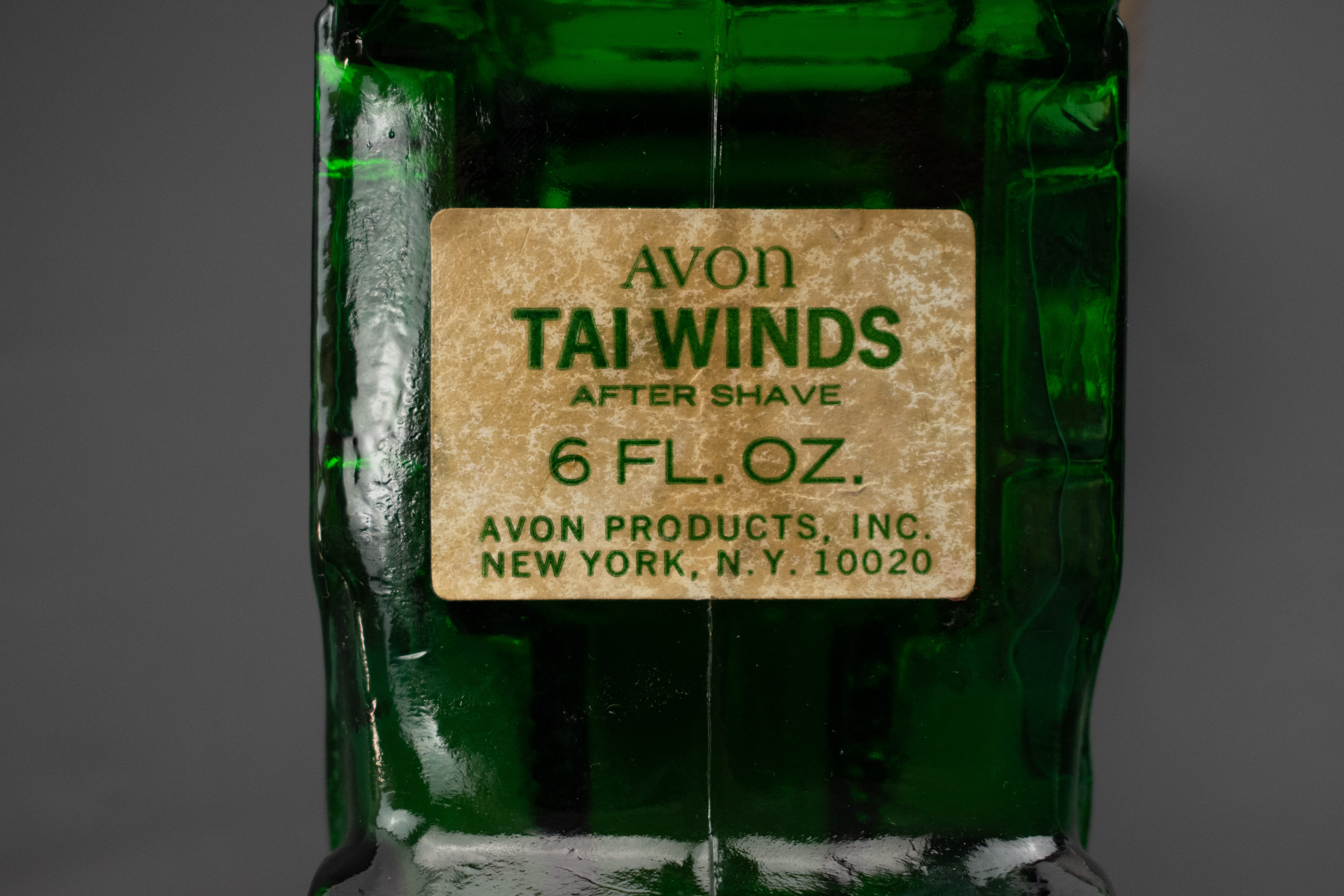 Avon Green glass Bottle Tai Winds 6.FL OZ Vintage Car Filled DAMAGED