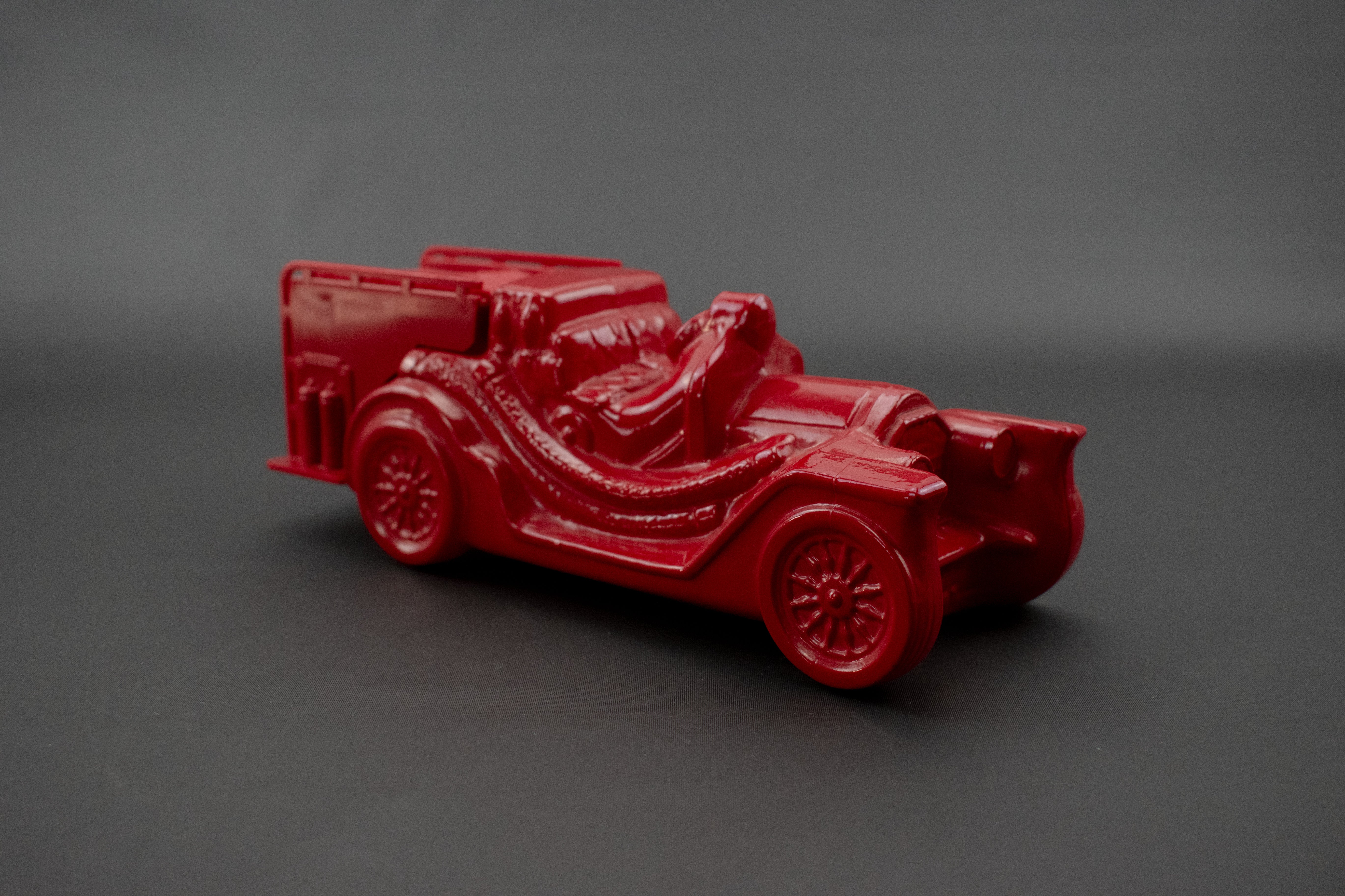 Avon Tai Winds After shave Vintage fire truck after shave bottle 6 FL. Oz used Red