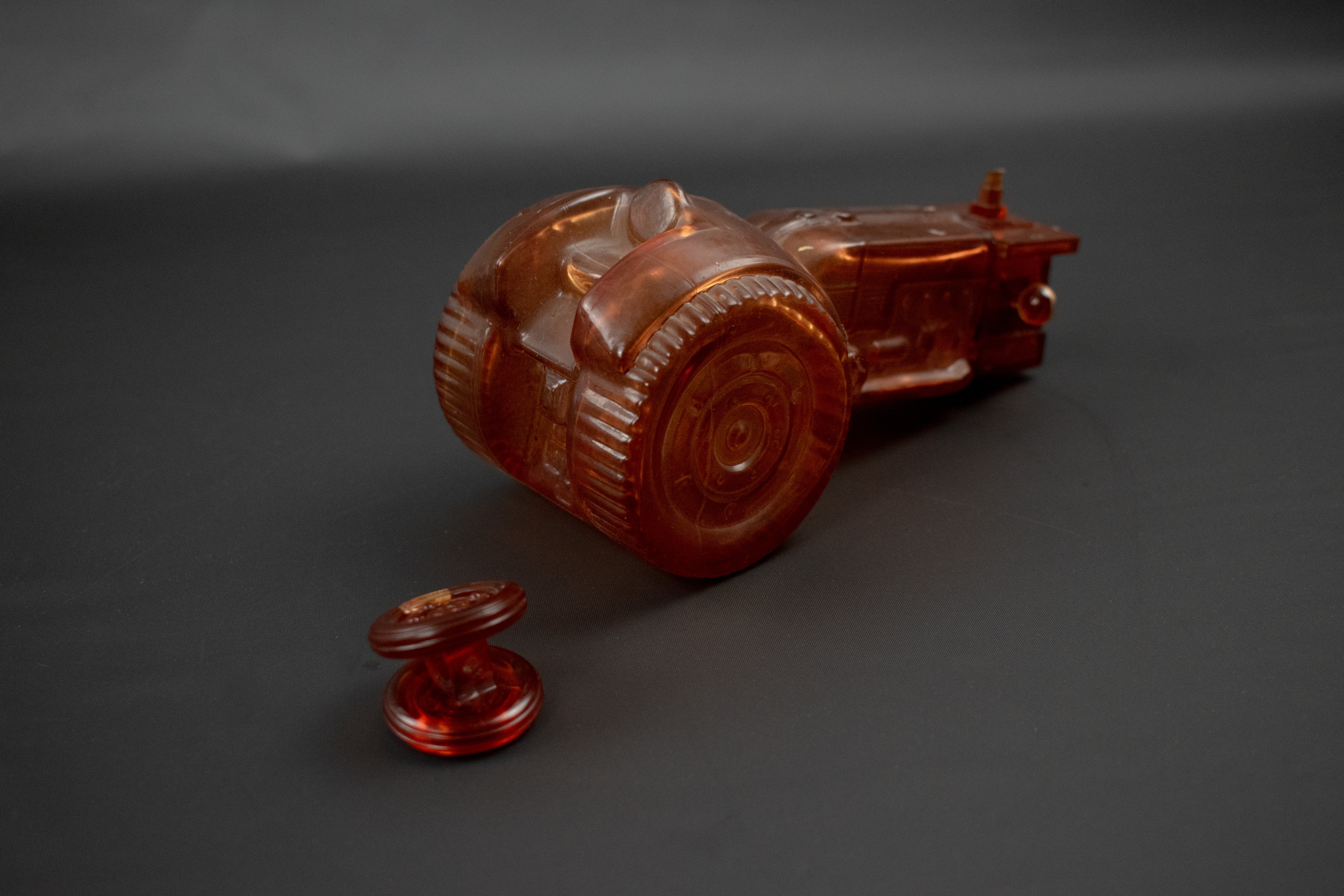 Avon After Shave bottle Orange Tractor Broke wheel used empty