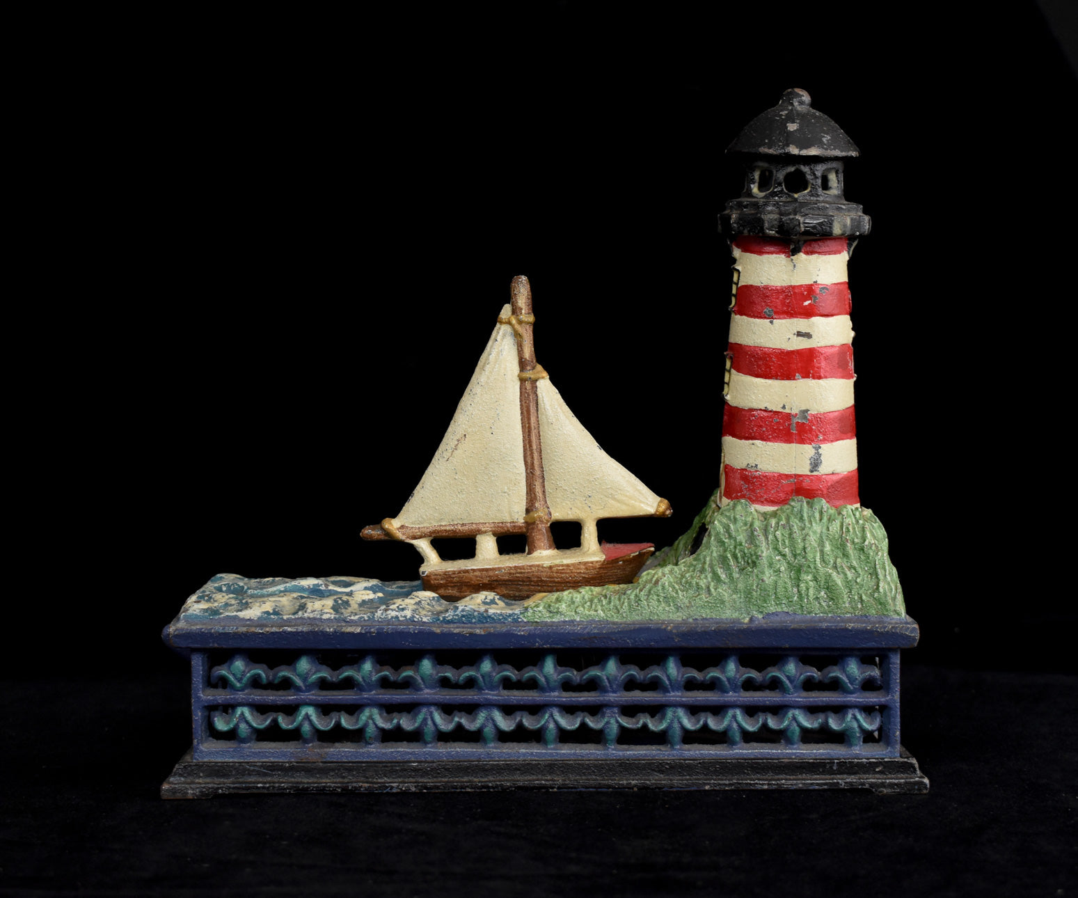 Bits & Pieces Cast Iron Nautical Light House and Sailboat Coin Bank Used