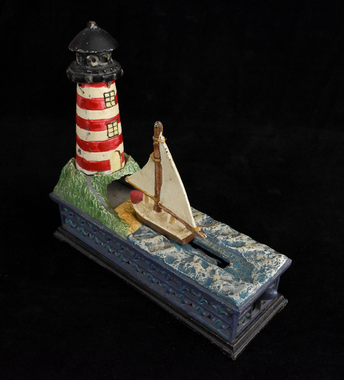 Bits & Pieces Cast Iron Nautical Light House and Sailboat Coin Bank Used