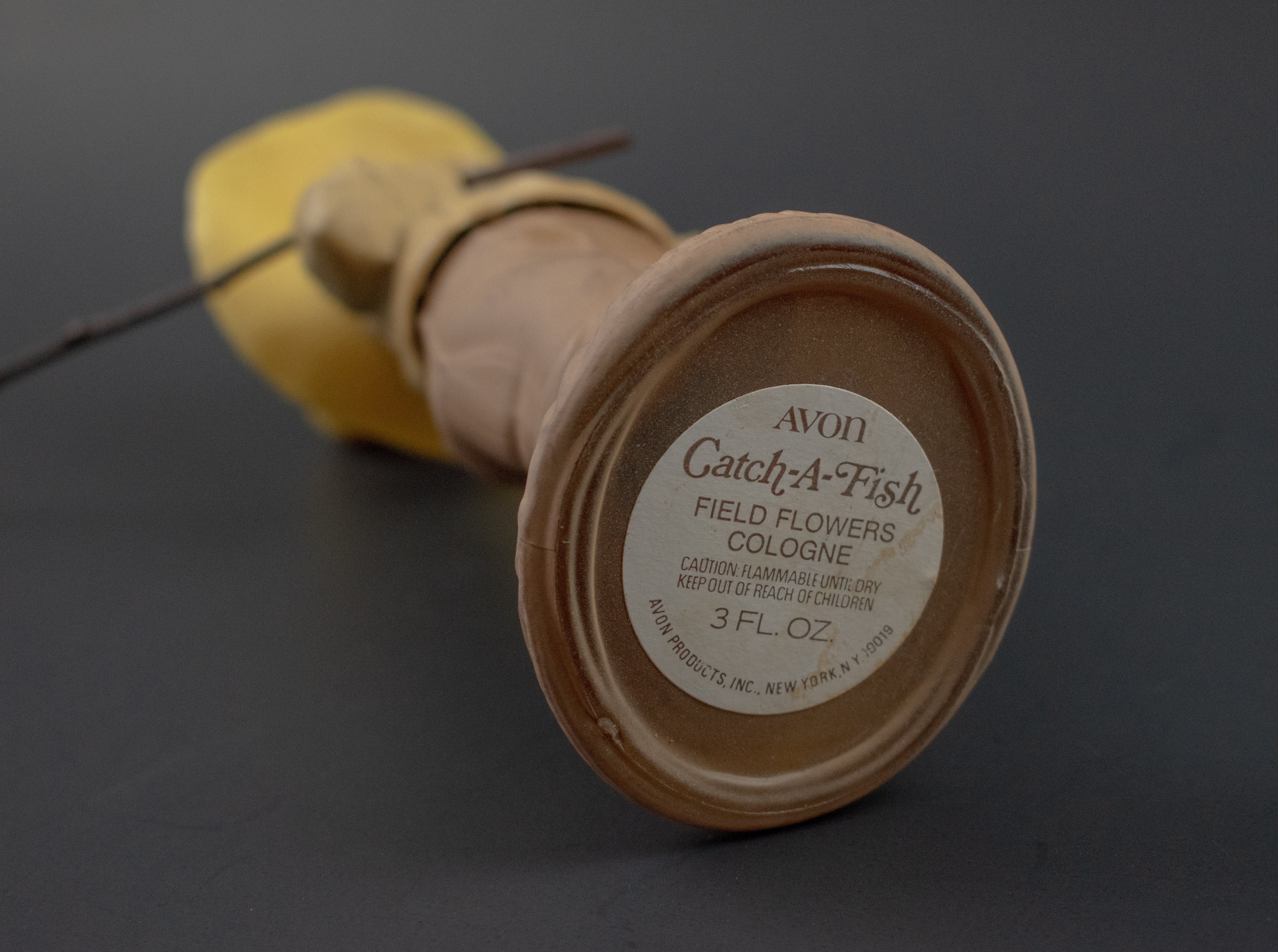 Avon Whistling Boy Bottle Vintage Catch A Fish Field Flowers Cologne