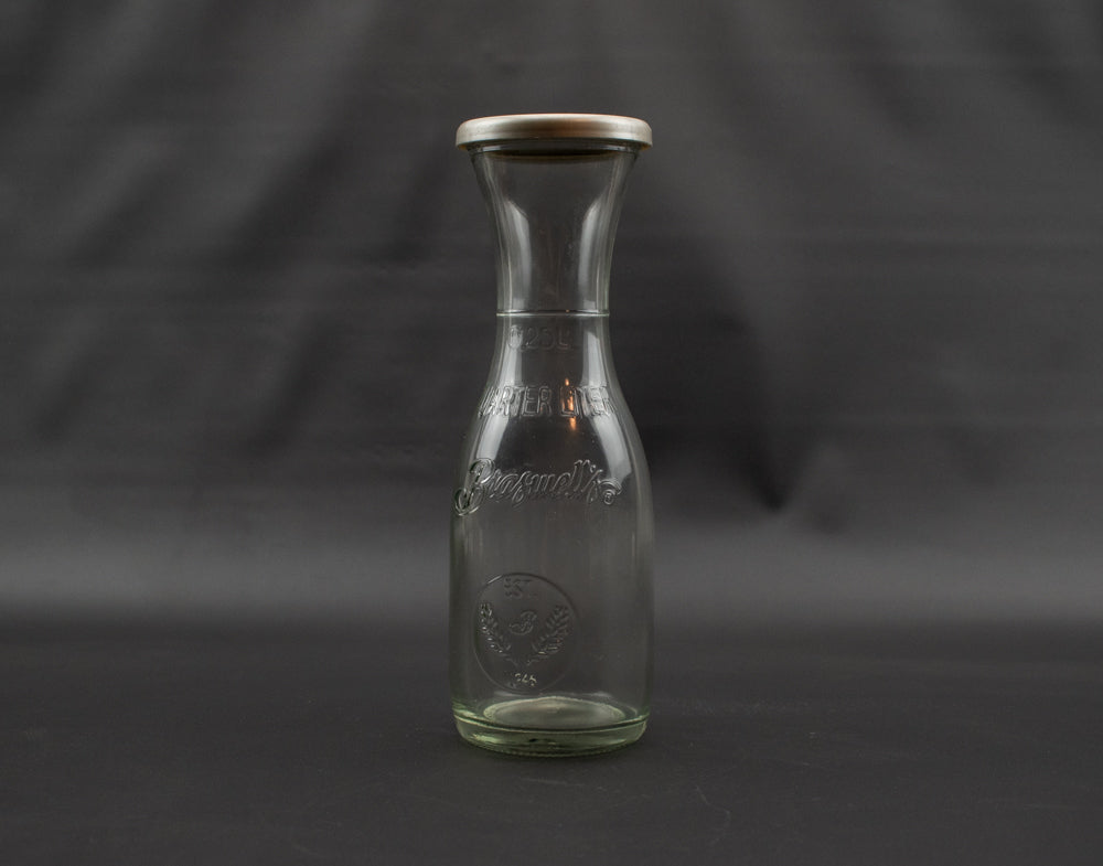 Braswell's 1946 Quarter Liter Clear Glass vintage Milk Bottle with Reusable Snap on