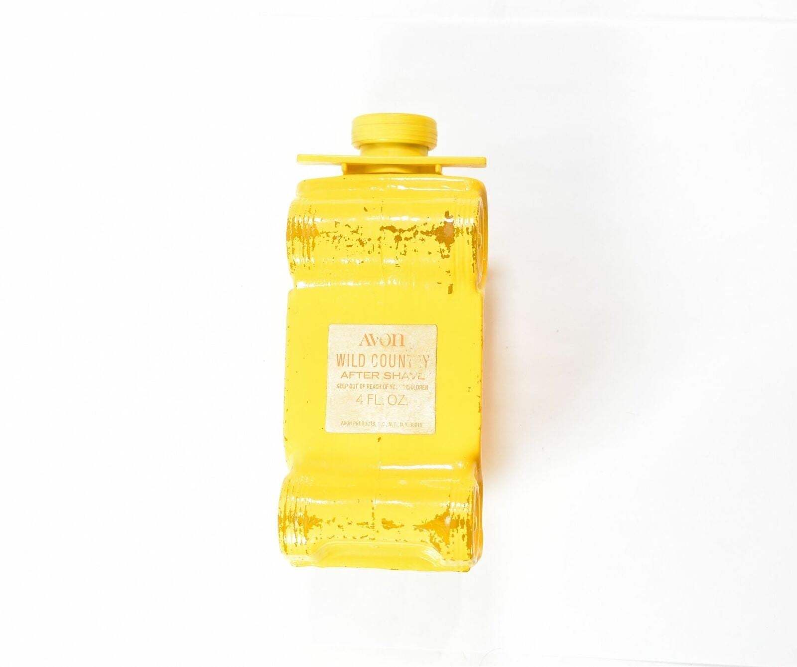 Avon Yellow Glass Bottle car Wild Country 4 FL. Oz After Shave used empty