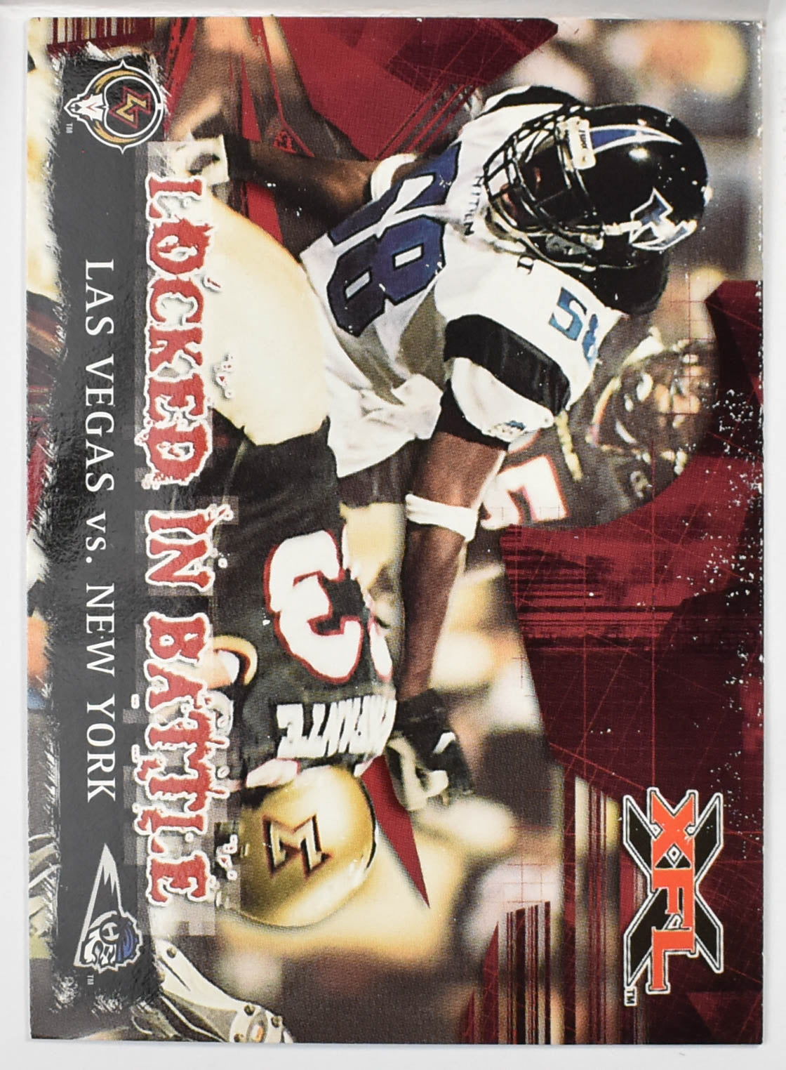 Topps XFL Football Card 2001 80 Las Vegas vs New York Locked in Battle