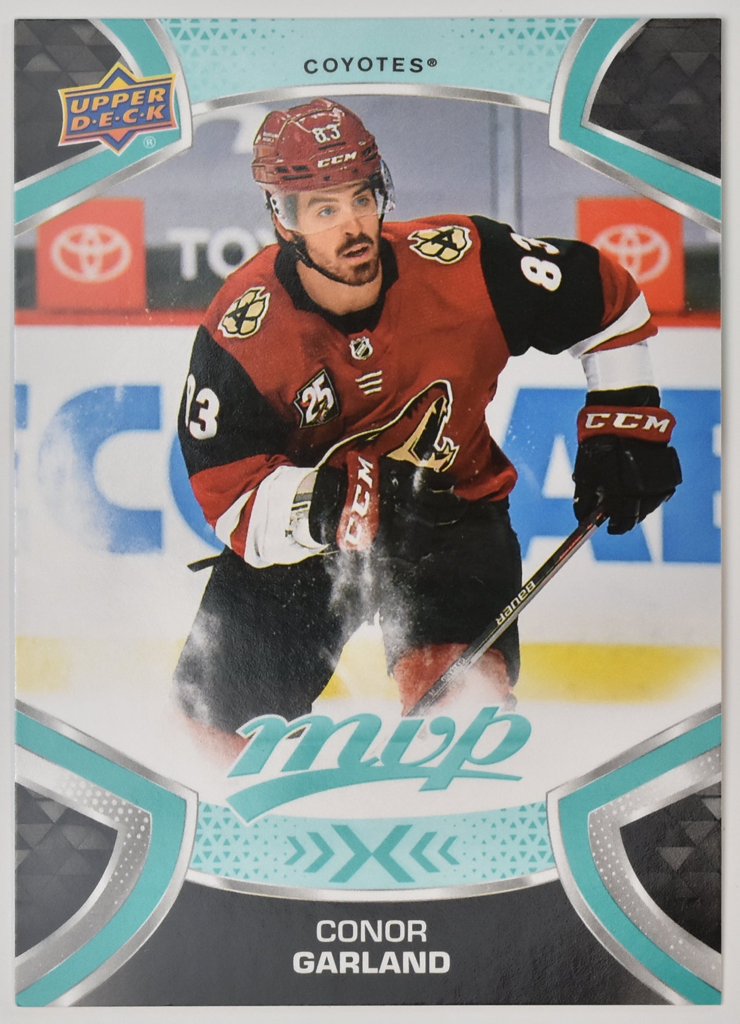 Conor Garland 129 MVP NHL Hockey Card Upper Deck 2021-2022