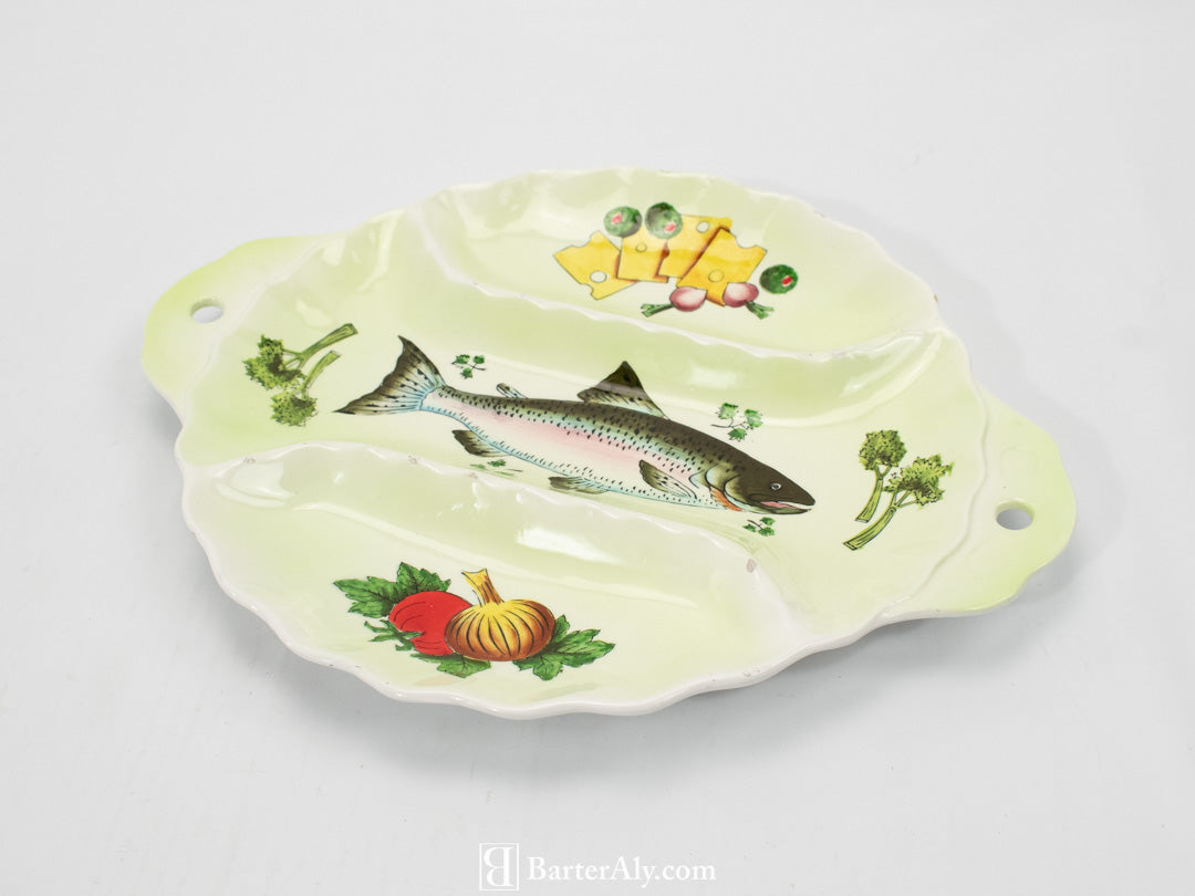 Fish and veggies dinner serving plate appetizers used green
