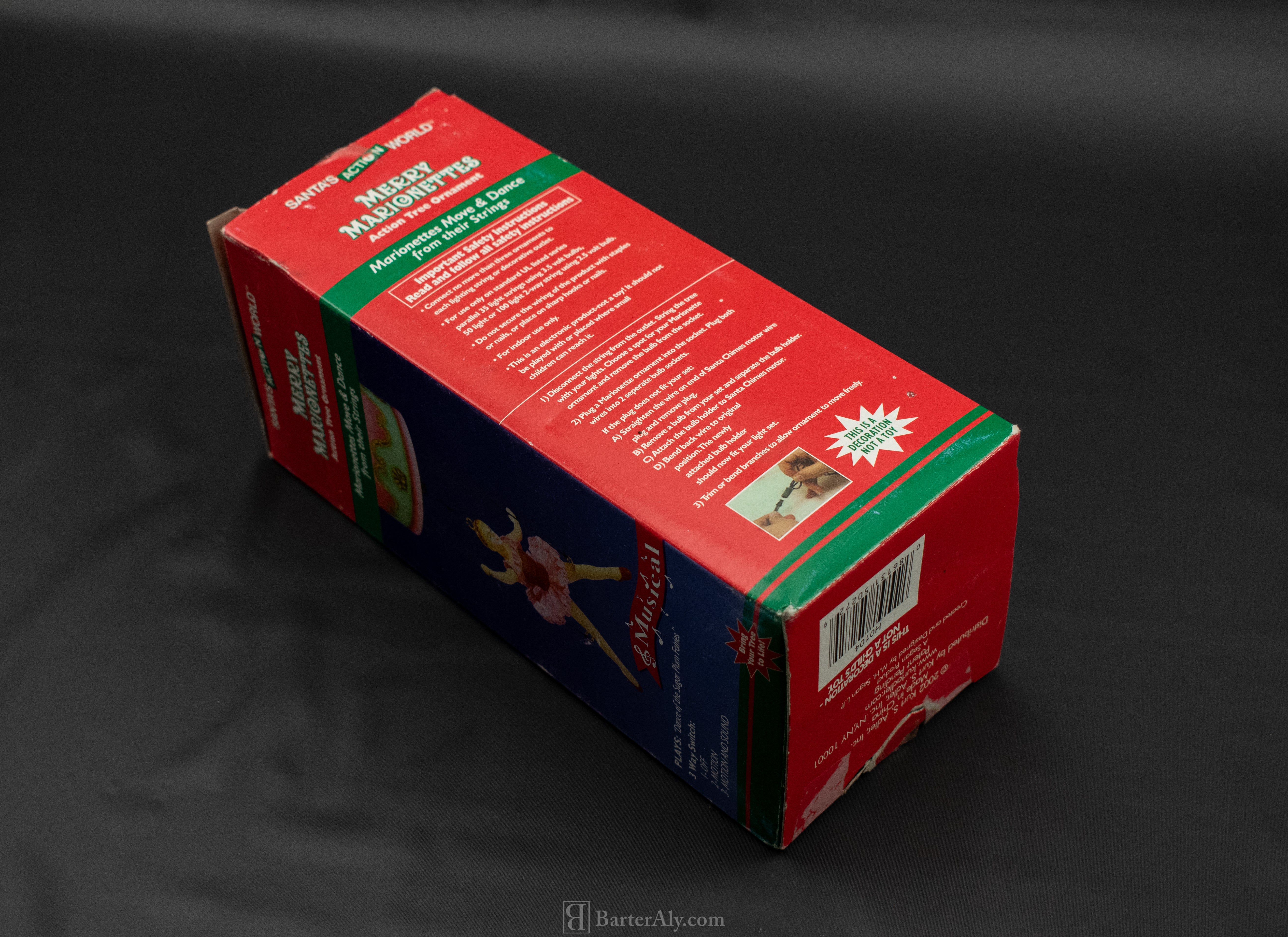 Merry Marionettes Action Tree Ornament Open Box Musical Christmas Move and dance Ornament