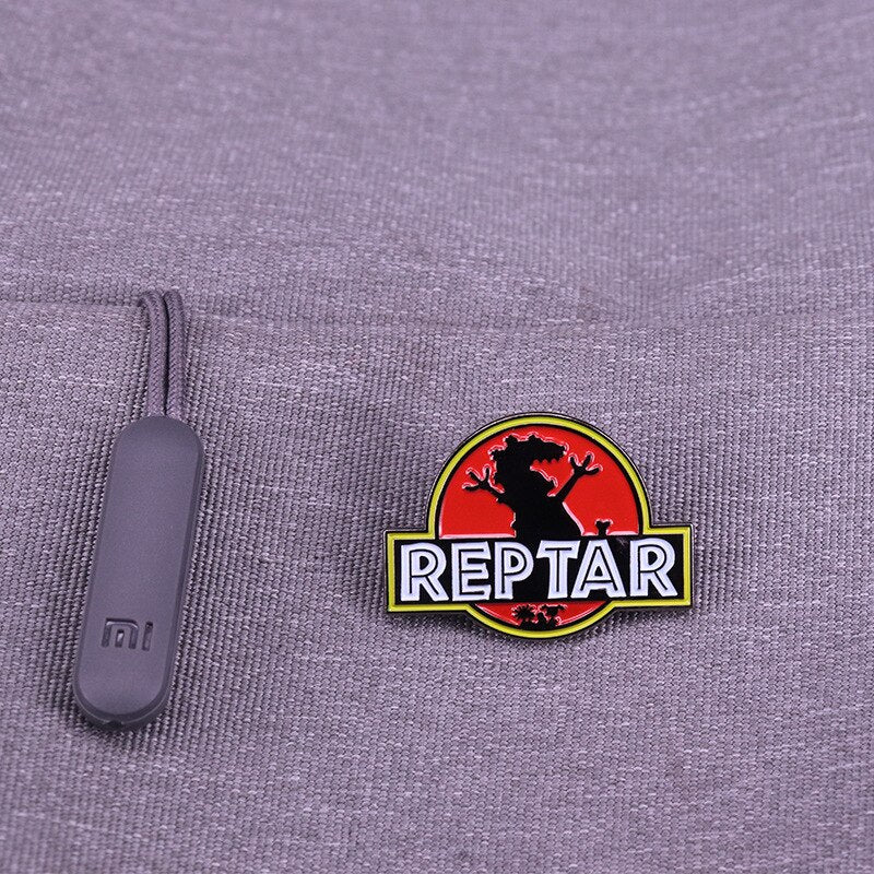 Cartoon Naughty Soldier Reptar Dinosaur Brooch Jurassic Park Inspired Mix and Match Badge