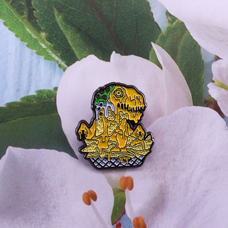 Melting animal badge on volcanic lava dinosaur brooch