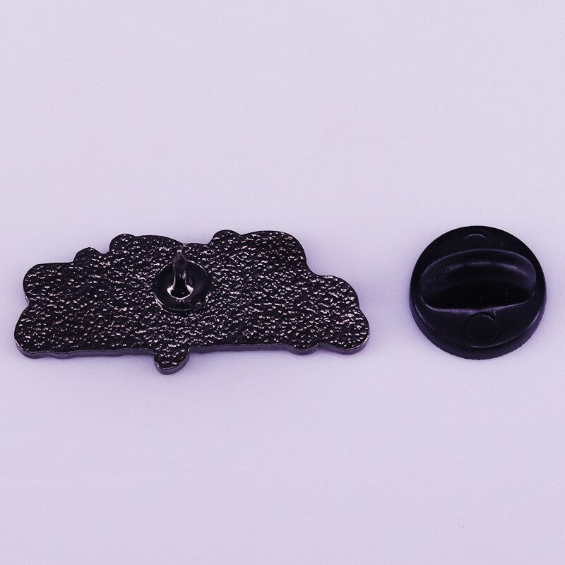 Female battle cry brooch