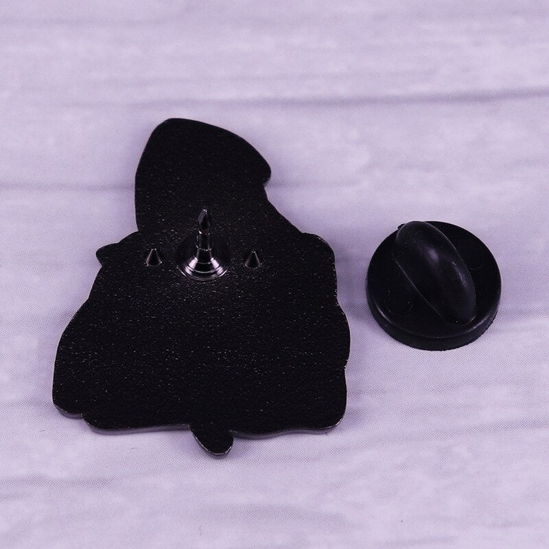 Cosmic Giant Seaman Skull and Cat Brooch 80s Fantasy Adventure Animation Inspiration Badge