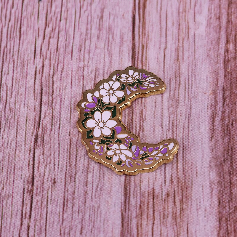 Pretty floral moon brooch