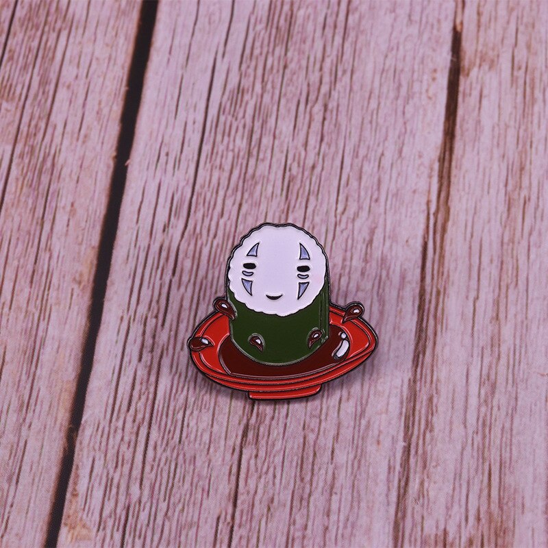 Faceless male sushi brooch creative food mashup badge