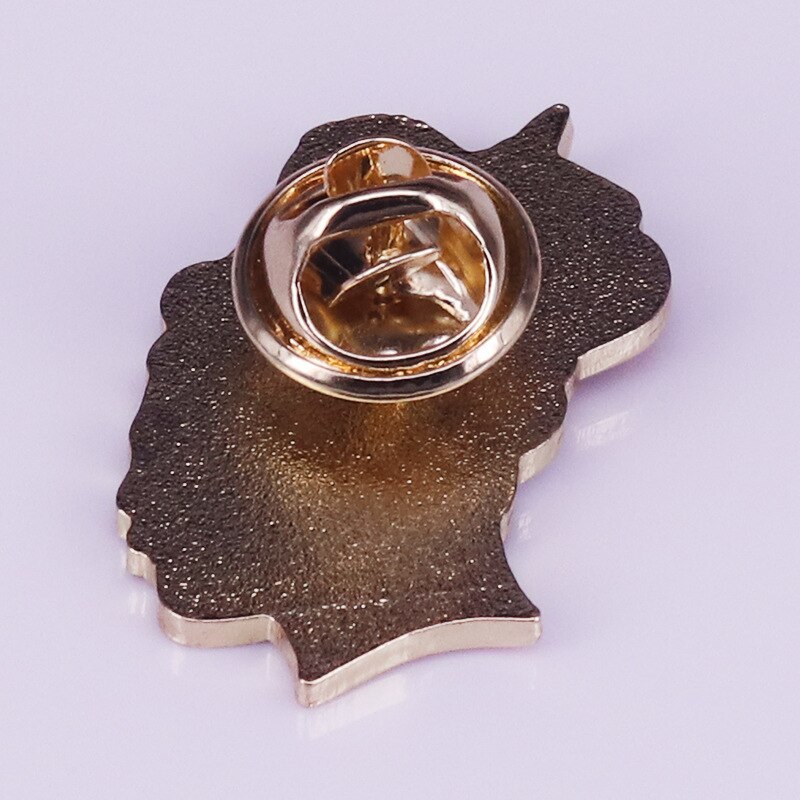 Queen lead singer Freddie Mercury brooch